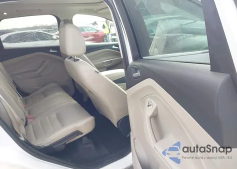 2017 Ford Escape Titanium z USA, uszkodzony, nr VIN 1FMCU9J96HUE25242